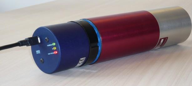 A compact USB-connected digital-base scintillation detector.