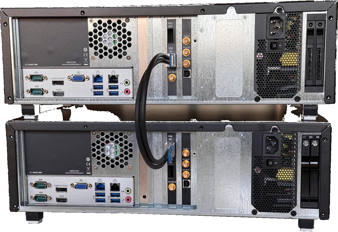 Two Model 686 units stacked and connected by a 686-SYNC cable between Sync OUT and Sync IN